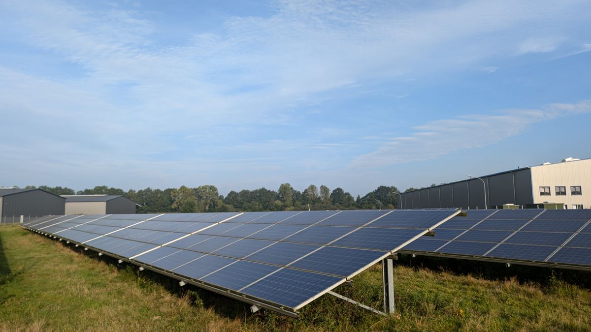 Fixed-tilt mounting structure with steel posts and module rails