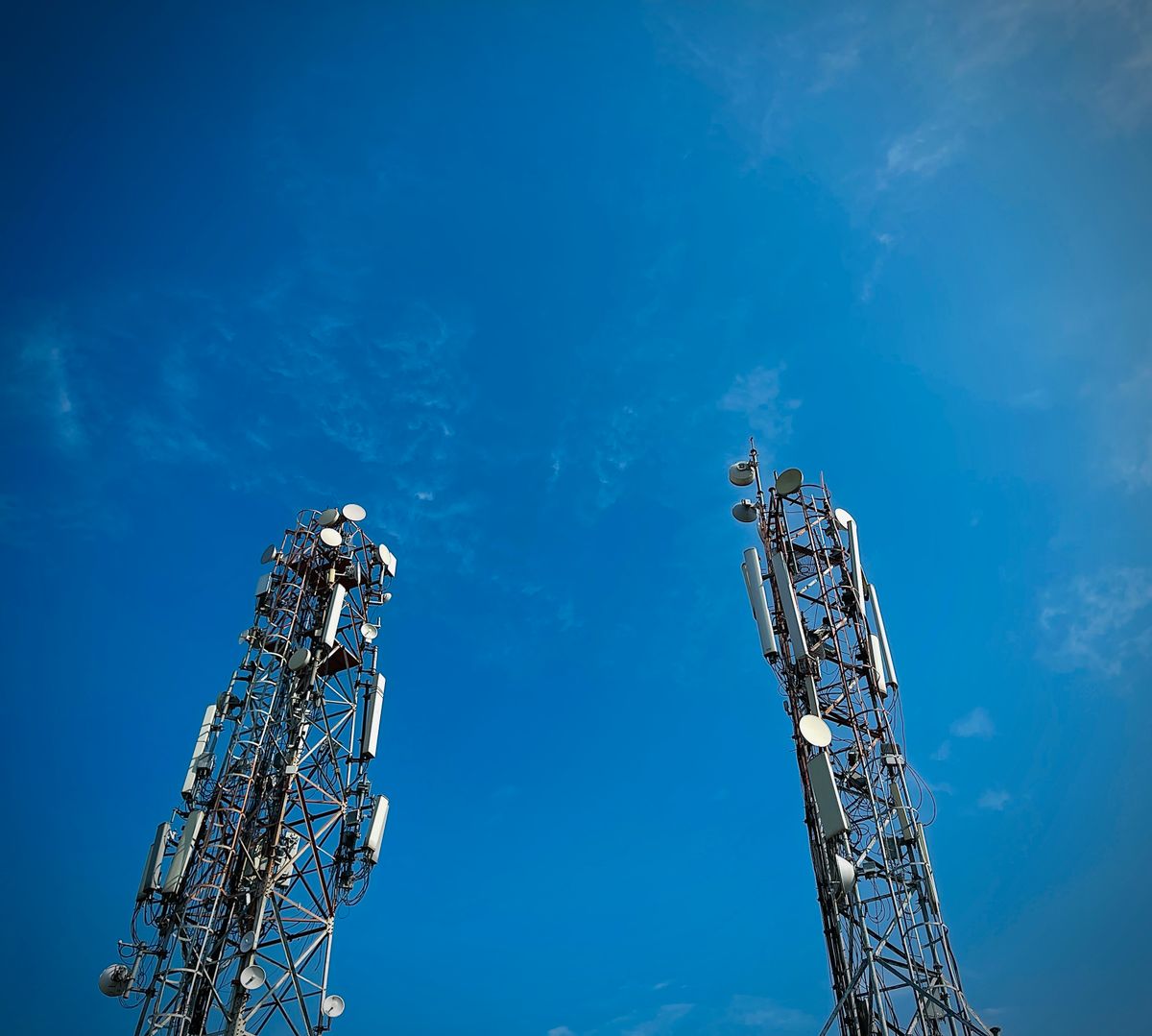 Telecom lattice tower with panel antennas and microwave dishes